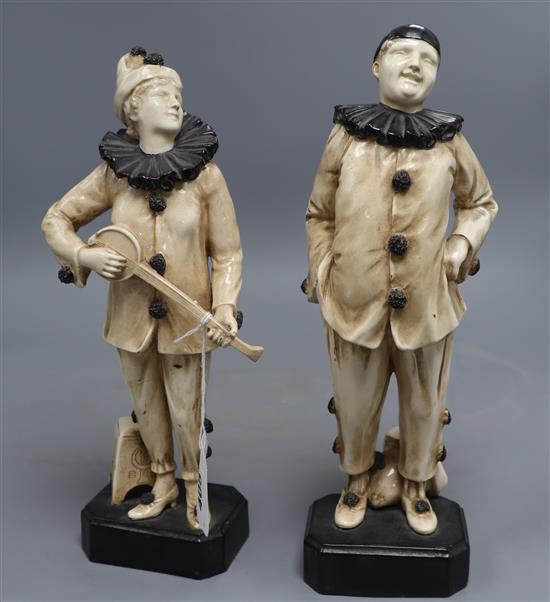 Two rare Bretby Art pottery figures of pierrots, c.1910,